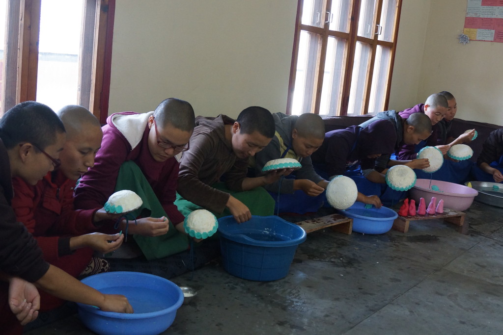 The nuns of Dolma Ling Nunnery making traditional Tibetan butter sculptures