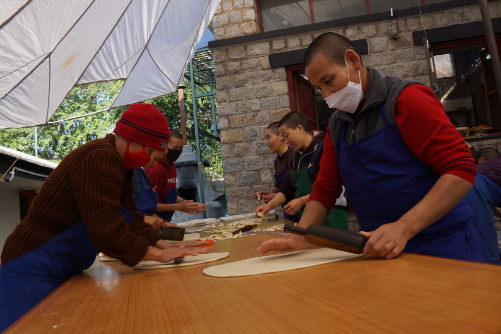 Nuns of Dolma Ling Nunnery Tibetan Buddhist nuns making khapse for Losar on March 2nd