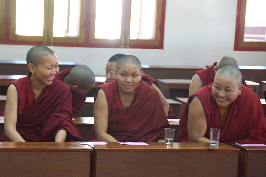 Three senior nuns awaiting their turns to debate during the 2014 Geshema examinations