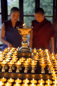 Tibetan Buddhist nuns performing puj