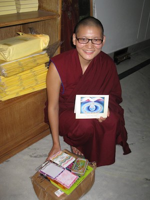 Sakya nun with a gift from her sponsor