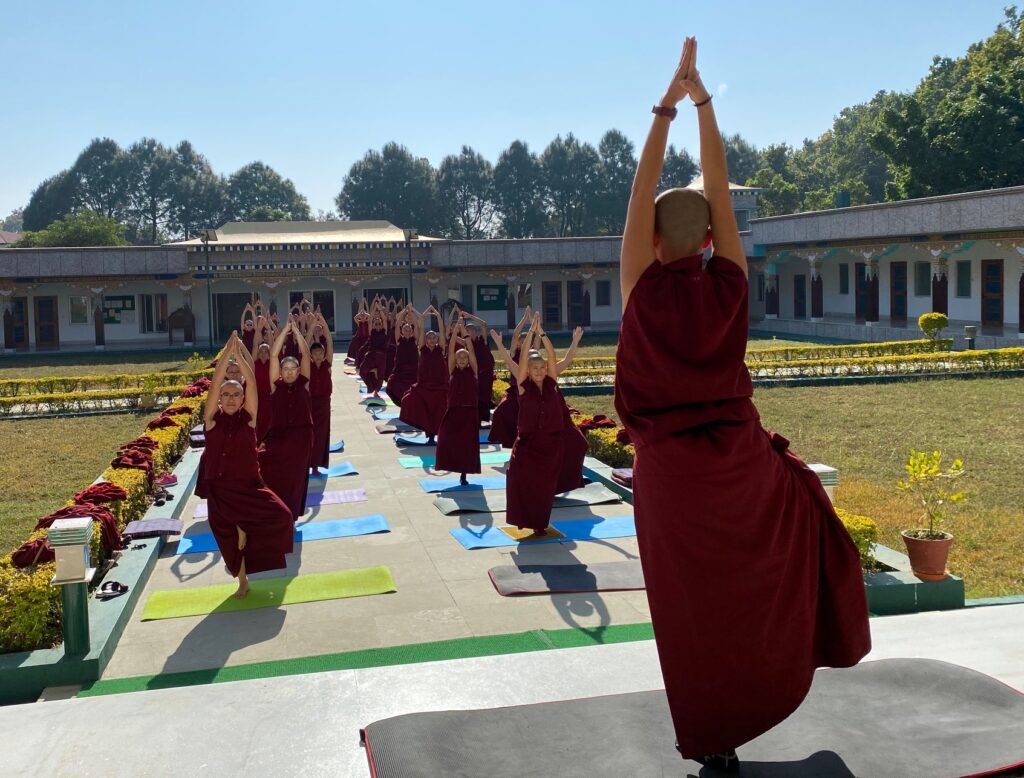 Tibetan Buddhist nuns learn yoga at Sakya College for Nuns