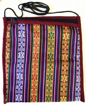 Bhutanese Fabric Bag is handmade and made with traditional bhutanese fabric, measuring 8″ x 10" with nylon crossbody strap and a zipper closure