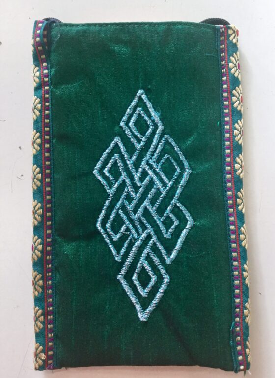 Cell Phone Holder_Green Cell Phone Pouch Green protects your phone, eyeglasses and other small valuables with a unique crossbody strap and embroidered eternal knot symbol at its center, handmade by Tibetan Buddhist nuns