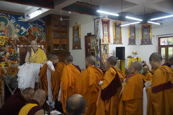 Nuns line up to offer kataks on His Holiness the Dalai Lama's 89th birthday