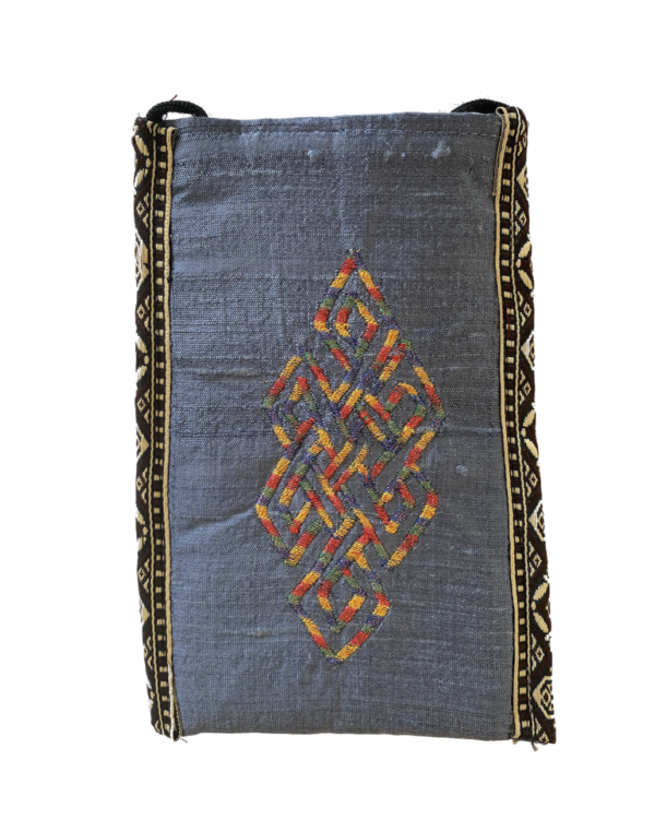 Dark Grey Phone Holder Cell Phone Pouch Dark Grey protects your phone, eyeglasses and other small valuables with a unique crossbody strap and embroidered eternal knot symbol at its center, handmade by Tibetan Buddhist nuns