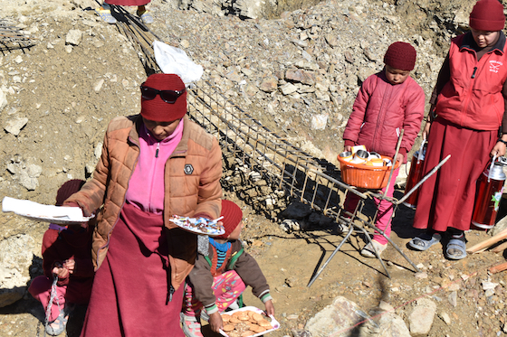 Distribution of sweets for foundation of Dorjee Zong Nunnery
