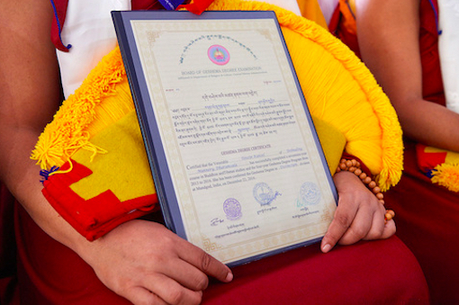 Nun holding her Geshema certificate, Geshema, Education Tibetan Buddhist nuns