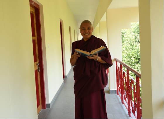 Happy Geshema Tibetan Buddhist nun at Dolma Ling Nunnery