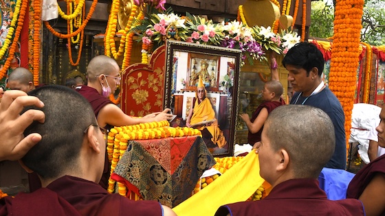 A portrait of His Holiness the Dalai Lama is placed at the Mahabodhi Temple in Bodh Gaya, marking the place where the Buddha attained enlightenment.