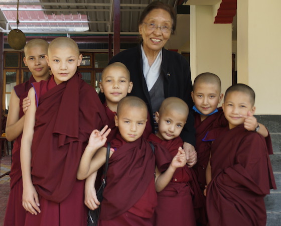 Rinchen Khando Choegyal with young Tibetan Buddhist nuns at Shugsep Nunnery
