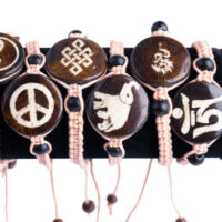 Macrame Bracelets are made of adjustable hand-woven macrame featuring painted traditional Tibetan designs and polished wooden beads, made by Tibetan Buddhist nuns