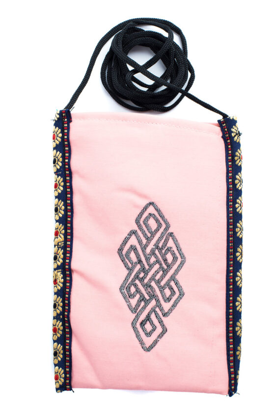 Cell Phone Pouch Cell Phone Pouch Pink protects your phone, eyeglasses and other small valuables with a unique crossbody strap and embroidered eternal knot symbol at its center, handmade by Tibetan Buddhist nuns