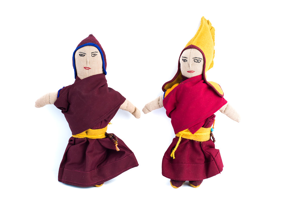 Nun and Monk Dolls are handmade by the nuns at Dolma Ling Nunnery, made from recycled nuns’ robes, dolls wear mini mala and a set of prayer beads