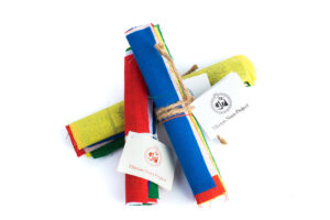 Tibetan multi-colored prayer flags are inscribed with auspicious symbols, invocations, prayers, and mantras, Prayer flags bring happiness, long life and prosperity