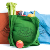 Shopping bag is made of cotton, reusable and eco-friendly with Tibetan Nuns Project screenprint on both sides.