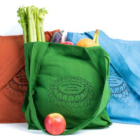 Shopping bag is made of cotton, reusable and eco-friendly with Tibetan Nuns Project screenprint on both sides.