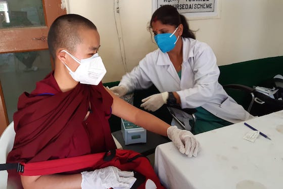 Tibetan Buddhist nun gets vaccinated for coronavirus May 2021, vaccinations, COVID-19 vaccination