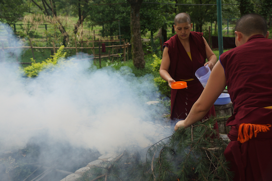 Tibetan Buddhist nuns, burning juniper
