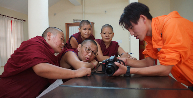 Tibetan Buddhist nuns learn how to use cameras