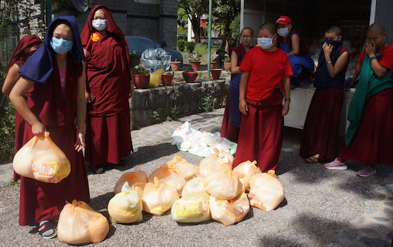 Tibetan Buddhist nuns distribute food during coronavirus pandemic, coronavirus lockdown, Dolma Ling nuns, food relief