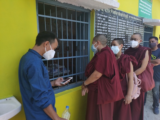 Tibetan Buddhist nuns get vaccinated for coronavirus