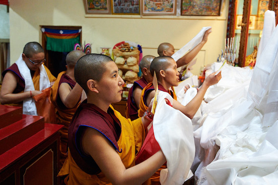 Tibetan Buddhist nuns, khata, offering Tibetan prayer scarf, kataks
