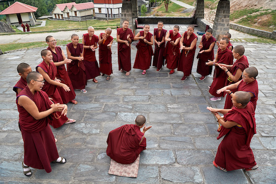 Nuns practicing debate daily at Dolma Ling Nunnery. 