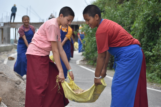 Tibetan Buddhist nuns working on Shugsep Retreat Center