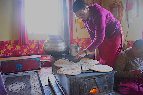 Tibetan nun cooks simple food