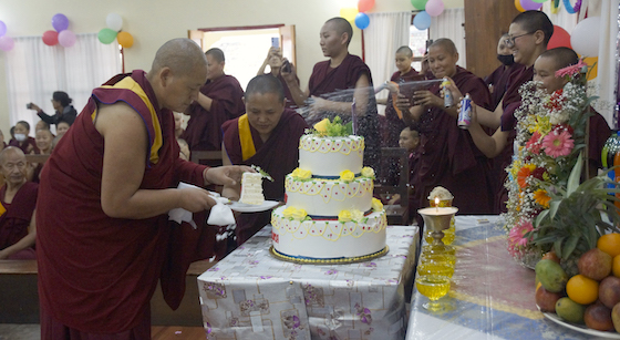 Tibetan Buddhist nuns, birthday cake for Dalai Lama,