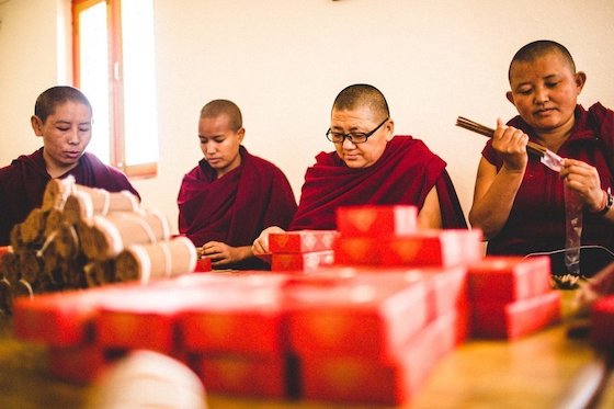 Nuns at Khachoe Ghakyil Ling Nunnery in Nepal making incense. Photo courtesy of DharmaShop