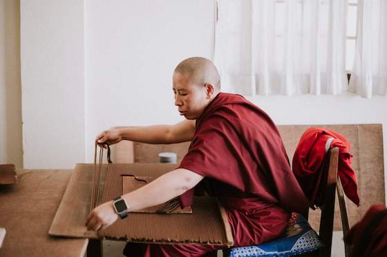 Tibetan incense being made by hand by nuns. Photo courtesy of DharmaShop