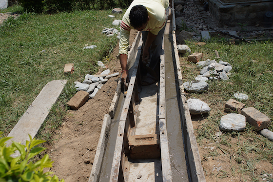 retreat hut drainage project at Dolma Ling